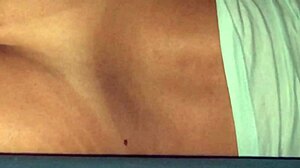 My wife relaxes in bed at home