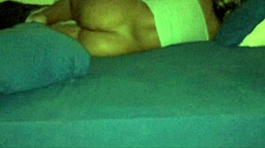 My wife relaxes in bed at home