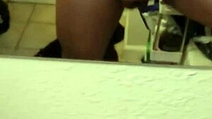 Black guy strokes his cock in solo masturbation