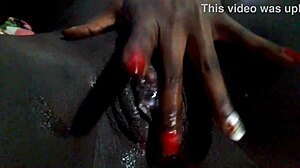 Juicy black pussy all covered in cum, clit pink inside!