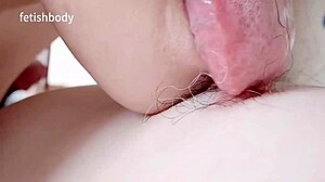 Licks ears and balls