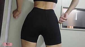 Nini tries on leggings, showcasing her petite figure