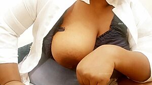 Asian aunty with big boobs and sexy tits relaxes.