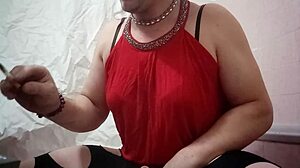 A travesti explores toys with a dildo in this narrative