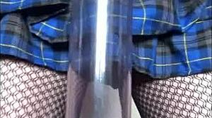 A sissy crossdresser in a bisexual crossdressing scene.