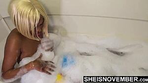 msnovember innocent brown skin black girl washing up in bathtub with rubber ducky big areolas on natural boobs hangers and dark nipples sheisnovember hd