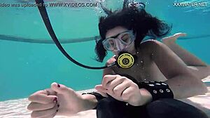 brita piskova dives deep, masturbating underwater in tight swimming pool