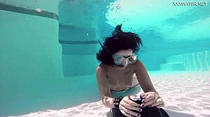 brita piskova dives deep, masturbating underwater in tight swimming pool