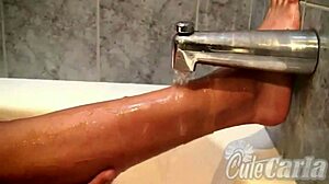 Cute Carla's playful shower fingering session