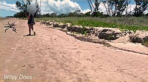 wife dares to play football nude at clothed beach