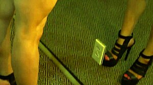 busty redhead milf flexes muscles seductively in mirror