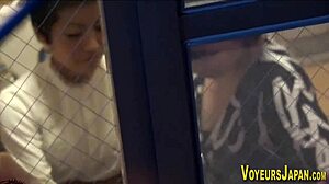 Japanese babe fingered and licked outdoors while watched