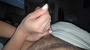 giving a handjob to this big black cock 😏