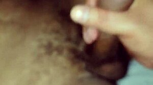 gay guy playfully sucks on a big toy in suggestive way