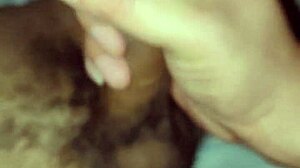 gay guy playfully sucks on a big toy in suggestive way