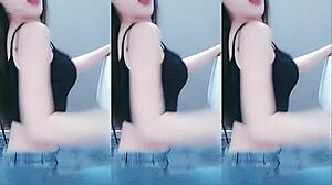 Pretty Chinese girl dancing with vibrator on cam