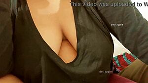 Man, check out this Asian aunty with big boobs showing off her sexy curves.