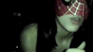 A cute girl with pigtails gives a blowjob to a big cock