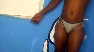 ebony girl standing while enjoying pussy strokes