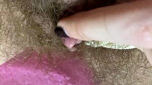 hey, check out this extreme big clit rubbing on wet hairy pussy