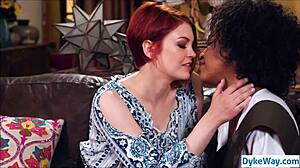 Black and white lesbians engage in passionate kissing and roleplay.