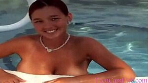 teen model in bikini teasing by the pool