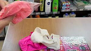 Solo Asian ladyboy in stockings buys thong at the convenience store