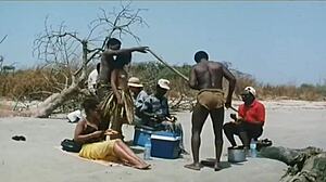 Kitu Gidwani without a shirt in a French film called Black