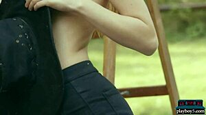Tiny redhead undresses and exposes her small tits
