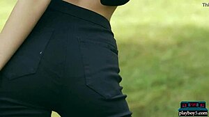Tiny redhead undresses and exposes her small tits