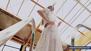 I’m stunned by Marketa’s amazing hairy underwater show at the pool.