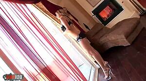 Blonde bends over for doggystyle, cum on big tits, and striptease.