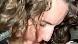 Darcy Dark gives blowjob in public cinema