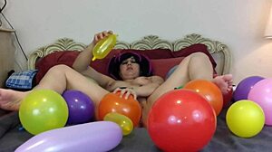 Pop balloons while masturbating with vibrator on bare feet. Fetish pleasure awaits.
