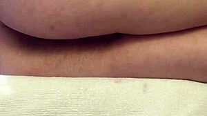 Teen’s super hairy pussy pulses in close-up orgasm while watching porn.