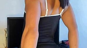 Tattooed brunette maid acts naughty in solo scene