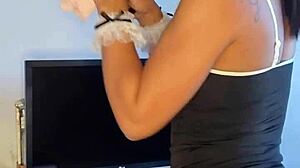 Tattooed brunette maid acts naughty in solo scene