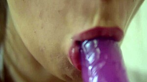 Watch this teen suck dildo close-up in solo play.