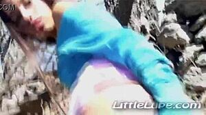 young colombian brunette little lupe performs striptease and masturbates in outdoor setting