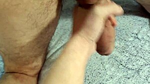 she's bent over for a hot handjob in doggystyle, cum on her