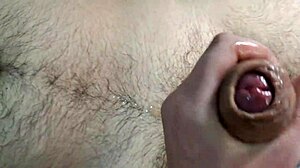 she's bent over for a hot handjob in doggystyle, cum on her