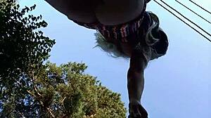 Young gay guy flashes big tits during naked suburban walks