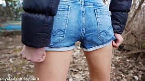 Strolling outdoors with a sextoy plugged in my tight butt