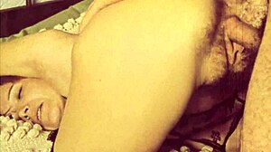 Dive into vintage porn with a hairy milf showcasing her big clit in retro interracial action.