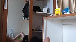 Gay man in red underwear and mask has anal sex with toy