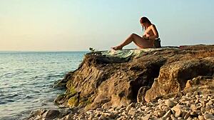 European redhead gets tanned on public nudist beach