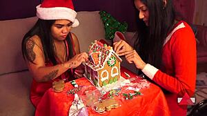 Girlfriend and friend make gingerbread house for christmas