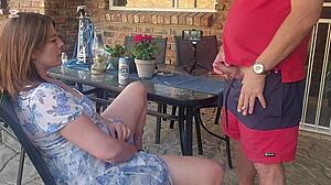 Mutual masturbation got wild when I caught my friend's wife fingering on the patio and joined her!