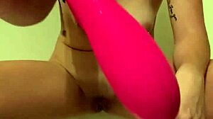 college freshman's tight pussy grips vibrator dildo during orgasm