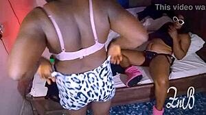 Zainab and Blacka Engage in Sexy Girl on Girl Lesbian Action in Dress
